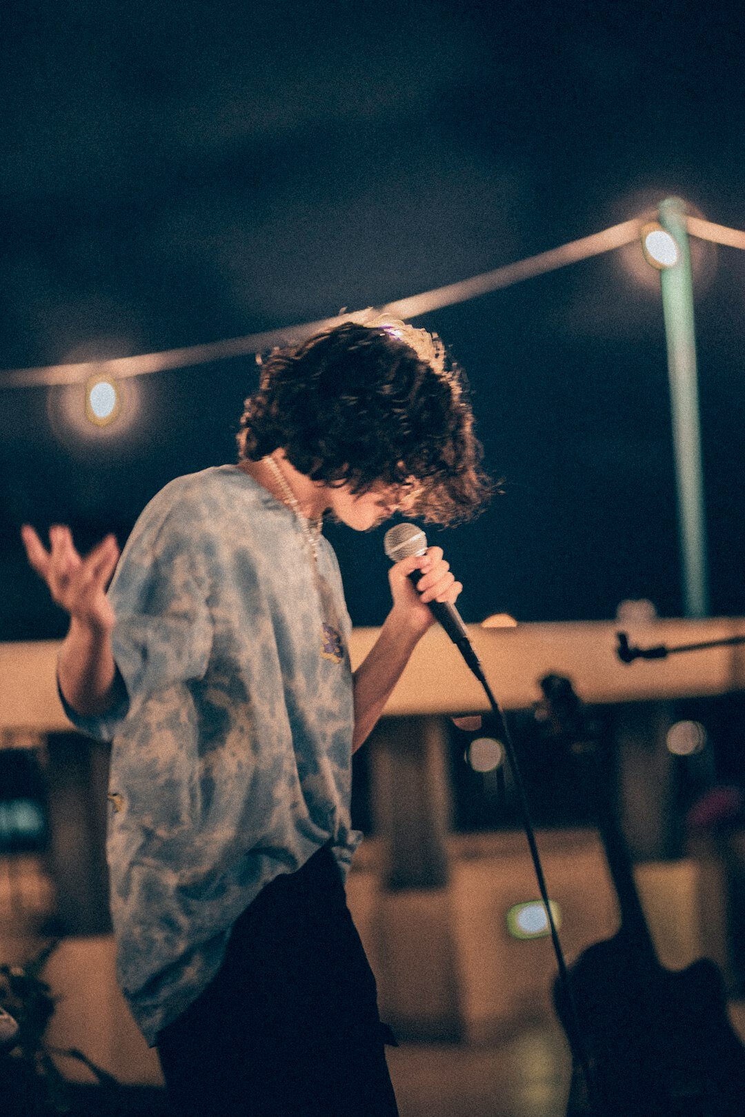 young latino singer performing