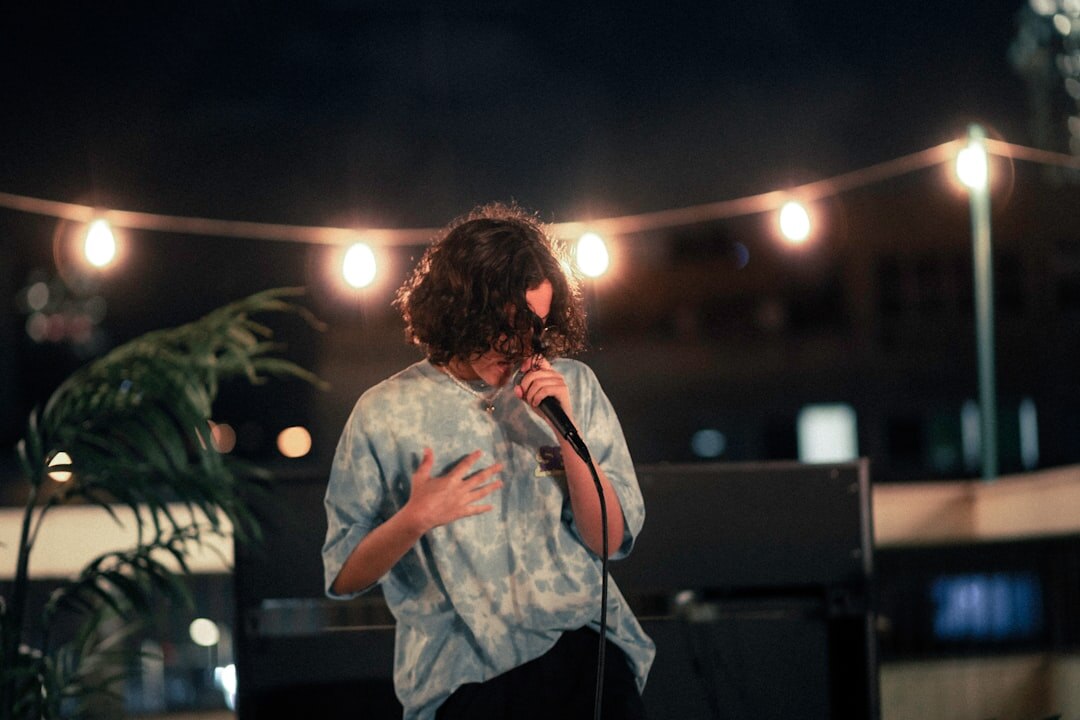 young latino singer performing