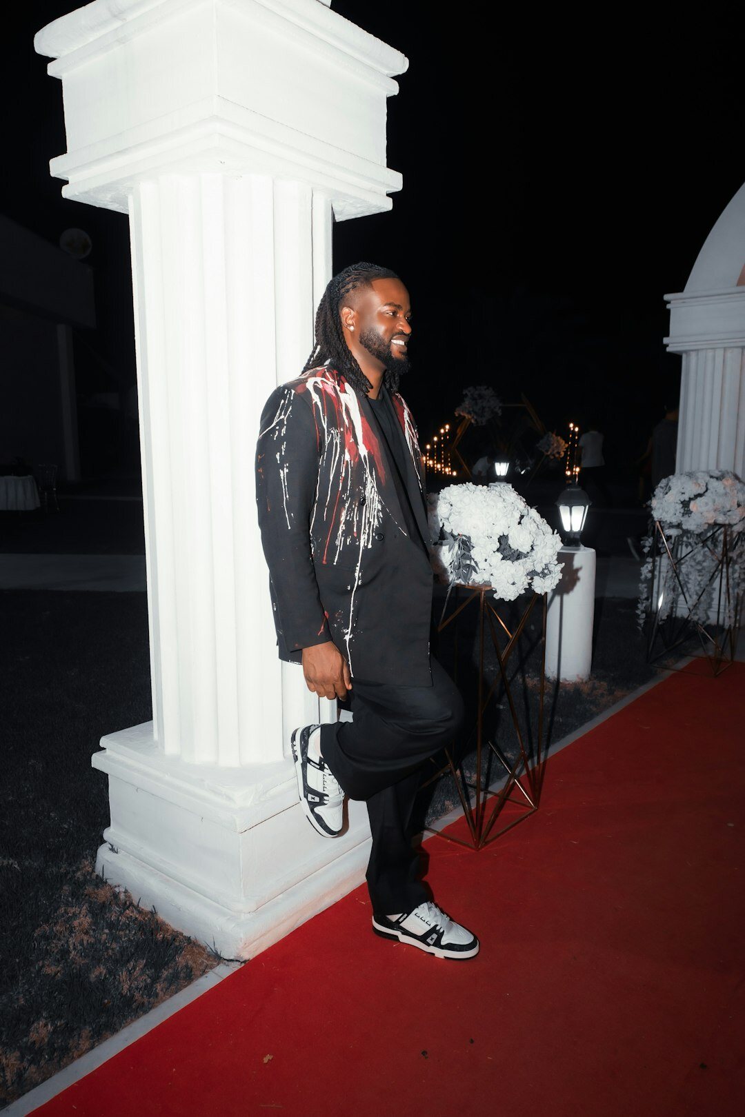 celebrity smiling on red carpet