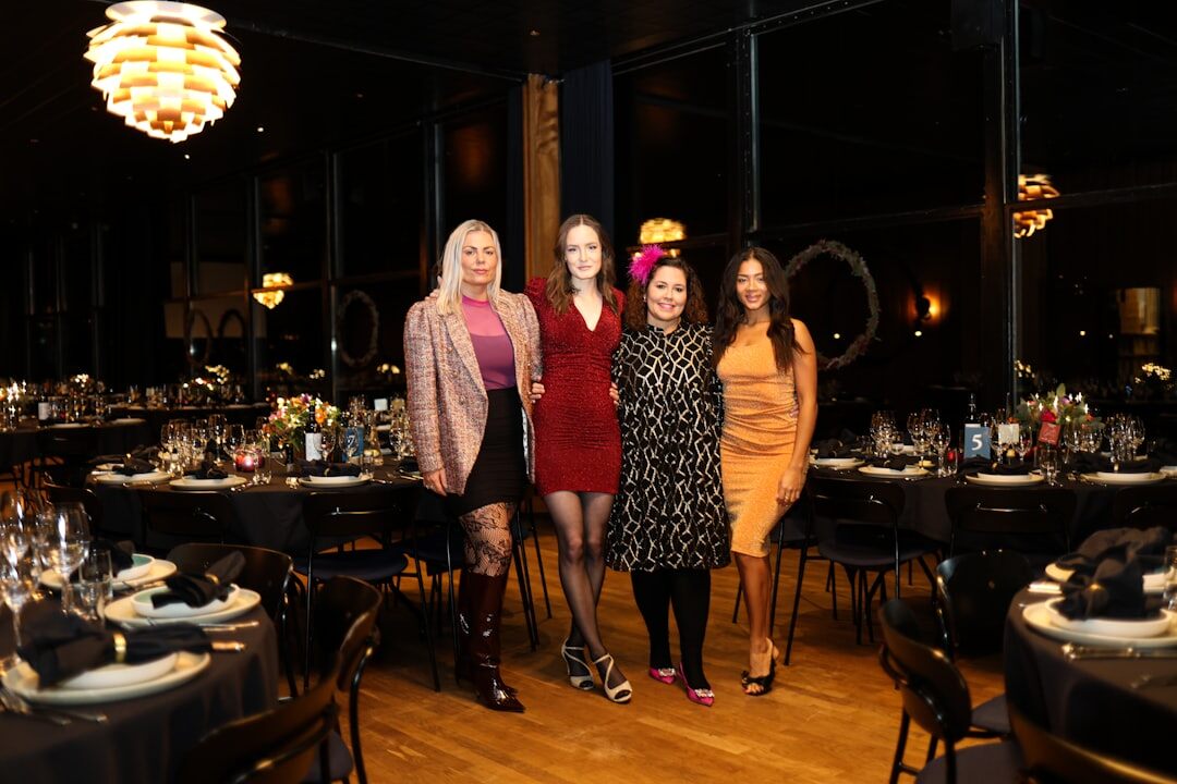 group of celebrities at event