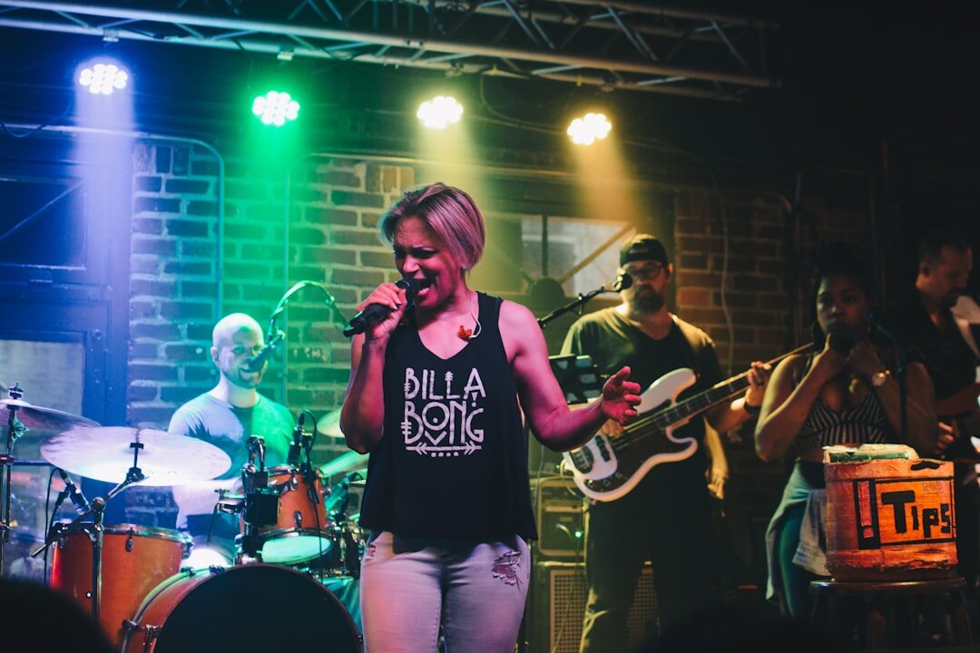singer performing live on stage